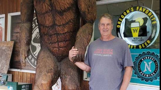 Dale, owner of Refreshing Pro Wash, standing at a local Eugene business, showcasing our top-tier pressure washing services in Eugene, Oregon, and commitment to community care.